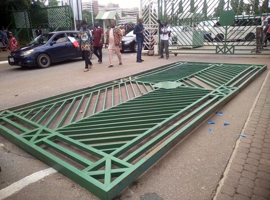 #SubsidyProtests: Protesters pull down National Assembly gate