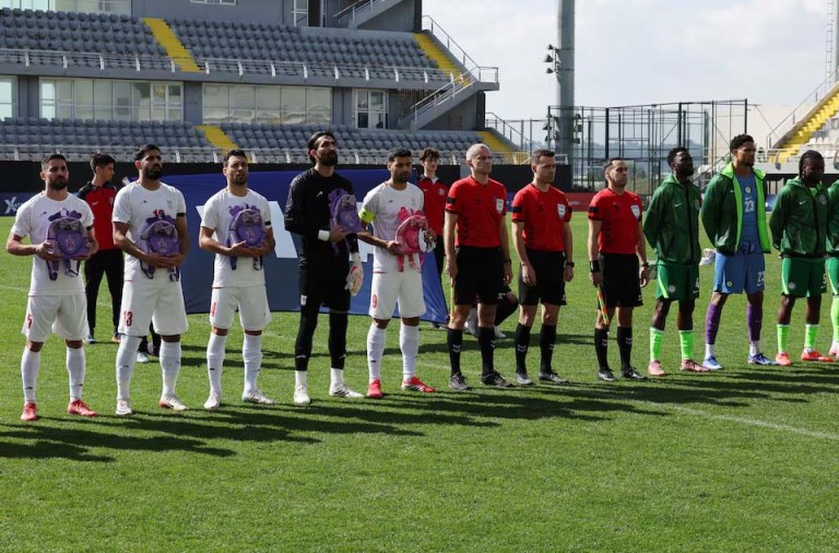 Iran Footballers Wear Black Armbands, Holds Schoolbags to Protest Killing of Schoolgirls